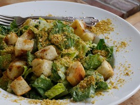 This March 28, 2016 photo shows a vegan Caesar salad in Concord, N.H. The combination of Japanese miso paste and nutritional yeast flakes mimics the rich, savory flavor this dish usually gets from anchovies and Parmesan cheese. (AP Photo/J.M. Hirsch)