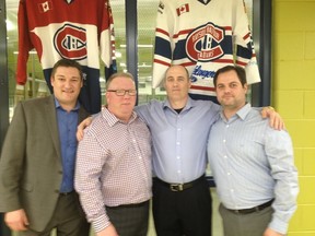 The Rayside-Balfour Canadians of the NOJHL named its new coaching staff Wednesday night at Chelmsford Arena. Darryl Moxam (left) will be head coach, Dave Clancy will serve as GM and associate coach, Adrian Geyde is the team's new owner and agelli Sakellaris will serve as an assistant coach. Bruce Heidman/The Sudbury Star
