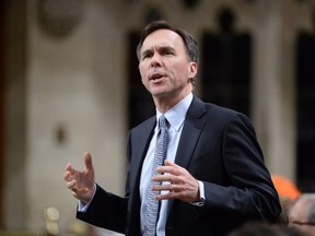 Finance Minister Bill Morneau answers a question during Question Period in the House of Commons in Ottawa, Monday, April 11, 2016. THE CANADIAN PRESS/Adrian Wyld