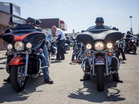Riders prepare to depart for Rochfort Bridge in front of Al's Sports Quest at the start of the Ride for Mom event in Whitecourt on Saturday May 9, 2015 in Whitecourt, Alta. This year's ride takes place on May . 

Adam Dietrich | Postmedia Network