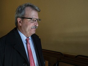 MPP JacK McLaren leaves  his Queen's Park office after avoiding the media about his website in Toronto, Ont. on Wednesday April 13, 2016. Craig Robertson/Toronto Sun/Postmedia Network