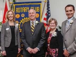 The Rotary Club of Kingston awarded the 2016 Paul Harris Fellow Award to recipients Michelle Gibson, from left, Vicky Pearson, Peter Dawe, Tanis Fairley, Paul Elsley, and Don Heath (absent) during a ceremony at Minos Village on Thursday. (Julia McKay/The Whig-Standard)