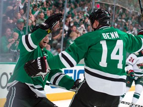 Dallas Stars centre Jason Spezza and left wing Jamie Benn (14) celebrate Spezza’s goal against the Minnesota Wild Thursday at American Airlines Center. (Jerome Miron/USA TODAY Sports)