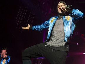 Hedley, fronted by Jacob Hoggard, performs at the Rogers K-Rock Centre in Kingston on Thursday night. (Hannah Lawson/For the Whig-Standard)