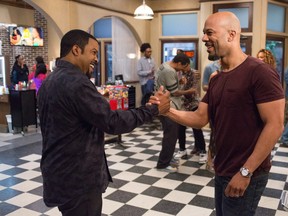 In this image released by Warner Bros., Ice Cube, left, and Common appear in a scene from "Barbershop: The Next Cut."