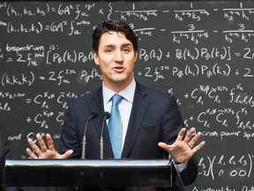Prime Minister Justin Trudeau makes an announcement at the Perimeter Institute for Theoretical Physics in Waterloo, Ont., on Friday, April 15, 2016. THE CANADIAN PRESS/Nathan Denette