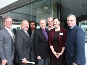 Durham Region officials gather to laud a newly released economic analysis on a GO train extension to Bowmanville at an April 8 press conference. (L-R) Durham College President Don Lovisa, Regional Chair Roger Anderson, MP Celina Caesar-Chavannes, MPP Lorne Coe, Councillor Dan Carter, MPP Jennifer French and Oshawa Mayor John Henry.