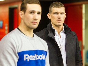 Rory MacDonald and Stephen Thompson look on during a media availability for the June 18 UFC Fight Night at TD Place on April 11, 2016. (Darren Brown/Postmedia).