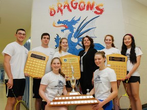 Marie Riviera Dragons coach Chantale Consigny poses for a photo with the top seven senior badminton players from the local french catholic secondary school in Kingston, Ont. on Tuesday April 12, 2016.  The seven players now head to Eastern Ontario Secondary School Athletic Association finals in Casselman, ON on April 21. Julia McKay/The Whig-Standard/Postmedia Network
