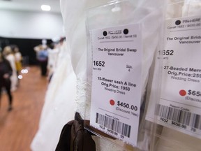 The discounted prices of wedding dresses are seen at the Original Bridal Swap at the Croatian Cultural Centre in Vancouver, B.C., on Sunday April 3, 2016.