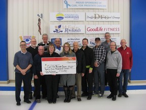 Participants in the London Curling Club?s Curl for Prostate Cancer present a cheque for $29,000 to the London Health Sciences Foundation. (Submitted photo)
