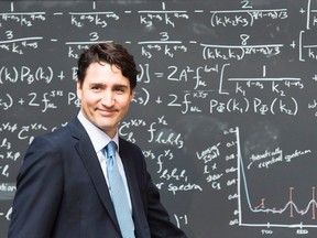 Prime Minister Justin Trudeau walks on stage to make an announcement at the Perimeter Institute for Theoretical Physics in Waterloo, Ont., on Friday, April 15, 2016. THE CANADIAN PRESS/Nathan Denette