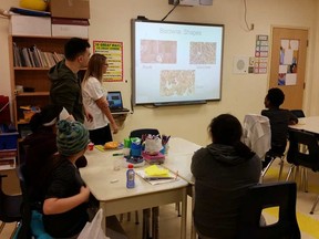 Students at Wabannutao Eeyou School in Eastmain, Que get a lesson in germs from travelling U of O grad students