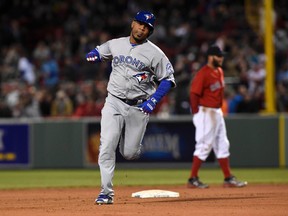 Toronto Blue Jays designated hitter Edwin Encarnacion rounds the bases after hitting his second home run of the game against the Boston Red Sox Friday at Fenway Park. (Bob DeChiara/USA TODAY Sports)