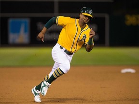 A's Khris Davis has swung and missed more times than he has laid wood on the ball early in his first season in the American League. (Kelley L. Cox, USA Today)