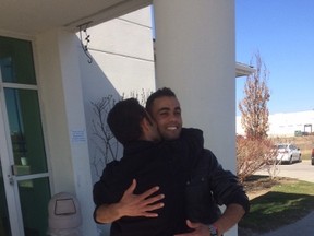 James Akam, a former interpreter who worked with our troops in Afghanistan for years, was reunited with his brother Nick on Saturday, his first full day in Canada. (Joe Warmington, Toronto Sun)