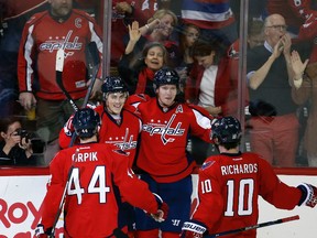 Washington Capitals right wing T.J. Oshie and center Nicklas Backstrom celebrate after Backstrom's goal during the third period of Game 2 against the Philadelphia Flyers. (AP Photo/Alex Brandon)