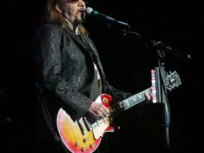 In this Friday, April 15, 2016 photo, Ace Frehley, singer, musician and former member of KISS, preforms at the FM Kirby center in Wilkes Barre, Pa. Shortly after the preformance, Frehley was admitted to a hospital for exhaustion and dehydration. (Dave Scherbenco/The Citizens' Voice via AP)