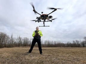 UAV operator and paramedic James Power flies a drone in Renfrew Ontario Tuesday April 12, 2016. The Renfrew County paramedic department uses a drone to fly over crash scenes and natural disasters to check out whats going on. (Tony Caldwell/Postmedia Networks)