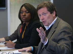 CivicAction's John Tory and Mitzie Hunter speak to the Toronto Sun editorial board on March 5, 2013. (Jack Boland/Toronto Sun)