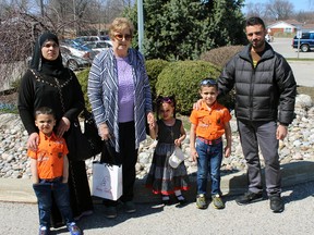 A Syrian refugee family has been brought to Sarnia through the Lambton Presbytery United Church Refugee Committee, which has partnered with local Presbyterian churches and Lambton College. Jaber Al Mudeer, right, his wife Houda Alzoubi, their six-year-old son Odai and four-year-old twins Mohammad and Nour landed in Sarnia Tuesday. (Terry Bridge/Sarnia Observer/Postmedia Network)