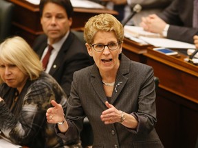 Premier Kathleen Wynne in the legislature at Queens Park  in Toronto, Ont. on Tuesday April 12, 2016. Stan Behal/Toronto Sun/Postmedia Network