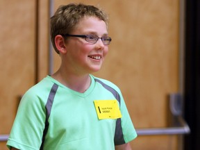 Isaiah Kozier smiles after winning the Kingston Region Spelling Bee at the Ongwanada Resource Centre on Saturday. (Steph Crosier/The Whig-Standard)