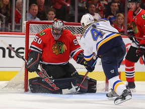 Chicago Blackhawks goalie Corey Crawford makes a save on a shot from St. Louis Blues defenseman Carl Gunnarsson during the second period in game three of the first round of the 2016 Stanley Cup Playoffs at the United Center. (Dennis Wierzbicki/USA TODAY Sports)