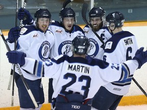 The Steinbach Pistons celebrate a second-period goal against the Portage Terriers during Game 4 of the MJHL final in Steinbach on Sun., April 17, 2016. Kevin King/Winnipeg Sun/Postmedia Network