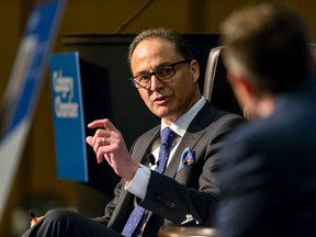 Alberta finance minister Joe Ceci speaks with Adam Legge, president of the Calgary Chamber of Commerce, during a Chamber breakfast at the Hyatt Regency in Calgary, Alta., on Monday, April 18, 2016. He was speaking about his recently released Budget 2016. Lyle Aspinall/Postmedia Network