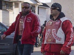Nomads motorcycle club members Phillip Boudreault (left) and Martin Bernatchez leave the Alfred Dallaire Funeral Home in Repentigny as they walk to the church for the funeral service of 63-year-old Lionel Deschamps, a member of Hells Angels Montreal chapter, Saturday, Nov. 7, 2015. Boudreau was shot in Lachute April 16, 2016. (Peter McCabe/Montreal Gazette)