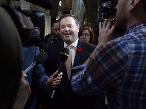 Conservative MP Jason Kenney arrives for a caucus meeting on Parliament Hill in Ottawa on Nov. 5, 2015. It's good to be Jason Kenney's friend, especially if you're running in an election for his party. The Conservative from Alberta, and former cabinet minister, sits in one of the wealthiest Conservative ridings in the country with a local war chest that dwarfs many of his colleagues. THE CANADIAN PRESS/Adrian Wyld