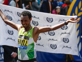 Lemi Berhanu Hayle of Ethiopia celebrates after winning the 120th Boston Marathon. (Greg M. Cooper-USA TODAY Sports)