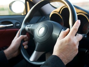 hands on steering wheel