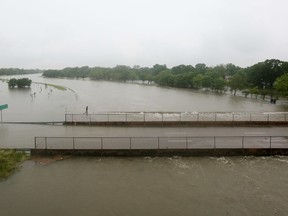 Brays Bayou floods after heavy rains hit the Houston region, Monday, April 18, 2016.  More than a foot of rain Monday in parts of Houston left scores of subdivisions and several major highways under water, knocked out power to thousands of people and closed schools.  (Jon Shapley/Houston Chronicle)