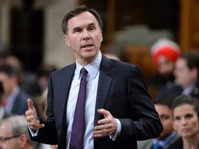 Finance Minister Bill Morneau answers a question during Question Period in the House of Commons in Ottawa, Monday, April 18, 2016. THE CANADIAN PRESS/Adrian Wyld