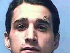 This undated file photo provided by the Nevada Department of Corrections shows Carlos Manuel Perez Jr. Documents made public in a federal wrongful death lawsuit blame Nevada prison guards for the shotgun killing of Perez, an inmate, and the wounding of another during a brawl in a High Desert State Prison hallway in November 2014. (Nevada Department of Corrections via AP, File)