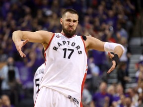 Toronto Raptors centre Jonas Valanciunas celebrates after making a basket against the Indiana Pacers in Game 2 of the first round of the NBA Playoffs at the Air Canada Centre in Toronto on April 18, 2016. (Tom Szczerbowski/USA TODAY Sports)