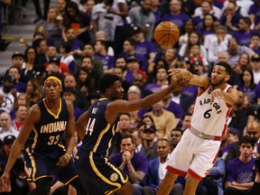 Toronto Raptors guard Cory Joseph makes a pass deep in Indiana Pacers territory during the third quarter of Game 2 at the Air Canada Centre in Toronto on April 18, 2016. (Jack Boland/Toronto Sun/Postmedia Network)