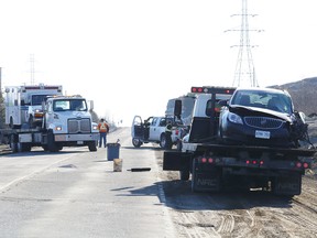 An ambulance is involved in a two-vehicle collision on the Lasalle extension between Elm Street and Frood Road Tuesday morning. John Lappa/The Sudbury Star