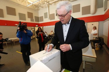 Manitoba NDP Leader and Premier Greg Selinger votes in the provincial election in Winnipeg, Tuesday, April 19, 2016. THE CANADIAN PRESS/John Woods
