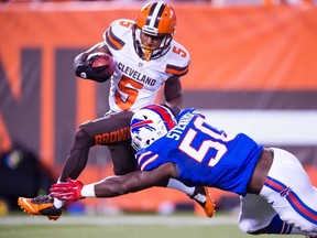 Wide receiver Shane Wynn of the Cleveland Browns is tackled by linebacker Tony Steward of the Buffalo Bills during the second half of a preseason game at FirstEnergy Stadium on August 20, 2015 in Cleveland, Ohio. (Jason Miller/Getty Images/AFP)