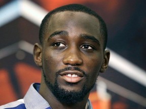 Boxer Terence Crawford is accused of causing $5,000 in damage to a hydraulic lift during a dispute with a body shop owner in Omaha, Neb., according to police report. (AP Photo/LM Otero, file)
