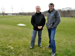 Steve Sauder, marketing specialist for the Upper Thames River Conservation Authority (right) and Pat Donnelly, the city’s urban watershed program manager, at St. Julien Park, the site of Earth Day London 2016, in London Ont. April 13, 2016. MONTANINI\LONDONER\POSTMEDIA NETWORK