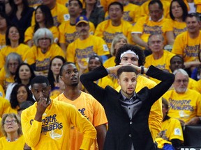 Golden State Warriors guard Stephen Curry reacts to a foul call against the Warriors during action against the Houston Rockets in the first quarter in game two of the first round of the NBA Playoffs at Oracle Arena. (Mandatory Credit: Cary Edmondson-USA TODAY Sports)