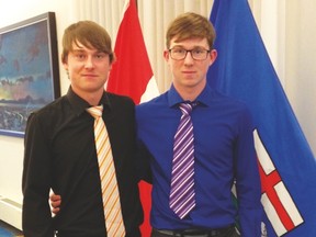 Brothers Logan and Nash Nelson, who live in the Milo area, recently received Duke of Edinburgh silver medals from Alberta’s lieutenant-governor in Edmonton. Submitted photo