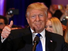 Republican U.S. presidential candidate Donald Trump gives a thumbs up as he speaks at his New York presidential primary night rally in Manhattan, New York, U.S., April 19, 2016.    REUTERS/Shannon Stapleton