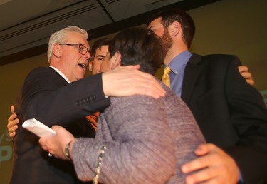 Manitoba NDP leader Greg Selinger hugs his family after being defeated by the PC's in the provincial election April 19, 2016. Selinger also announced that he will step down as party leader.
Brian Donogh/Winnipeg Sun/Postmedia Network