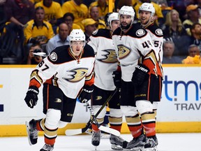 Ducks players celebrate after a goal by centre Rickard Rakell (67) during second period NHL playoff action against the Predators in Game 3 of the first round series in Nashville on Tuesday, April 19, 2016. (Christopher Hanewinckel/USA TODAY Sports)
