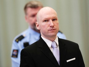 In this Friday, March 18, 2016 file photo, Anders Behring Breivik stands on the fourth and last day in court in Skien, Norway. The right-wing extremist was convicted of terrorism and mass murder for 2011 bomb and gun attacks in Norway that killed 77 people. (Lise Aserud/NTB Scanpix via AP, File)